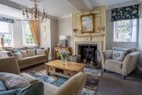 a living room with couches and a fireplace